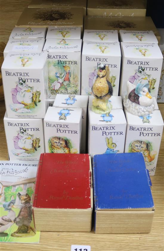 A collection of 26 Beswick Beatrix potter figures, 4 Beswick Beatrix Potter studio sculptures and 2 Doulton Dickens figures and teaset